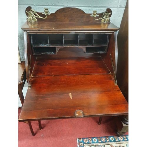 712 - An Arts and Crafts Mahogany narrow Bureau with full flap and Brass Candle Holders. 70 x 37 x 110H cm... 