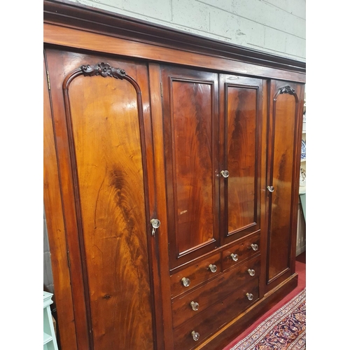 756 - A very large four door straight Wardrobe with fully fitted interior. W 240 x D 60 x H 220 cms approx... 