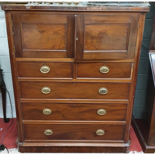 799 - A good early 19th Century Mahogany Linen Press with twin doors above a bank of drawers. 125 x 57 x H... 