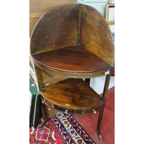 822 - A Georgian Mahogany Corner Washstand with single drawer frieze and gallery back. 68 x 40 x H 110 cms... 