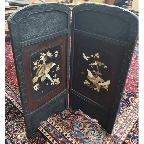 828 - A late 19th early 20th Century Oriental two panel Screen. 44 x H 95 cms approx.