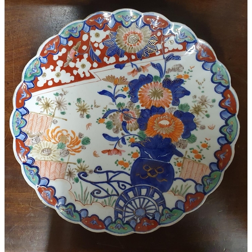 830 - A 19th Century possibly earlier hand painted Chinese Plate/Charger. D 28 cms approx.