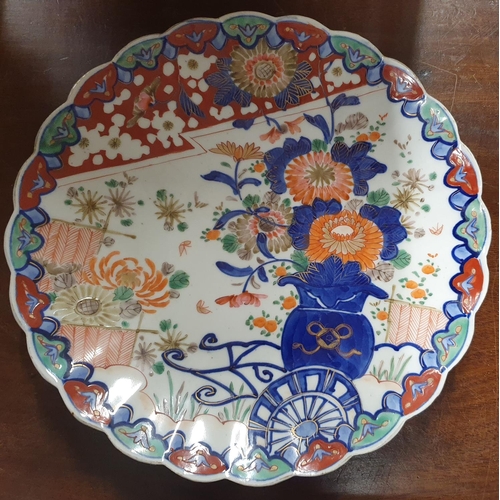 830 - A 19th Century possibly earlier hand painted Chinese Plate/Charger. D 28 cms approx.