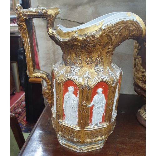 834 - A very unusual 19th Century Jug of a religious theme depicting Popes to the exterior. H 25 cms appro... 