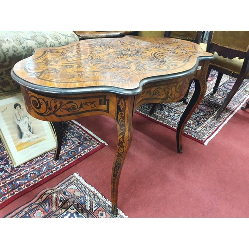 845 - A good Satinwood and Coromandel centre Table with swept supports and Ormolu mounts. 120 x 70 x H 74 ... 