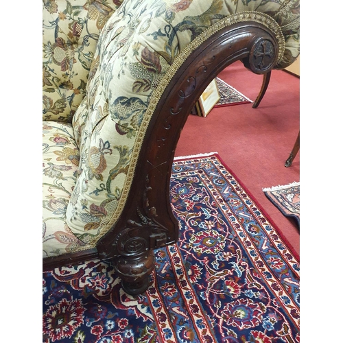 850 - A late 19th Century Irish Chaise Lounge with Mahogany showframe and deep buttoned back and arm. 200 ... 