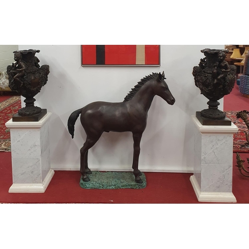 852 - A fantastic pair of Bronze Campana Urns on Stands with highly carved outline on Marbleised Bases. H ... 