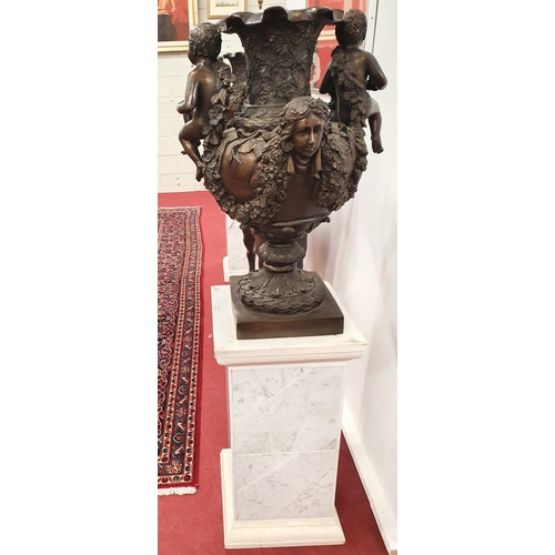 852 - A fantastic pair of Bronze Campana Urns on Stands with highly carved outline on Marbleised Bases. H ... 