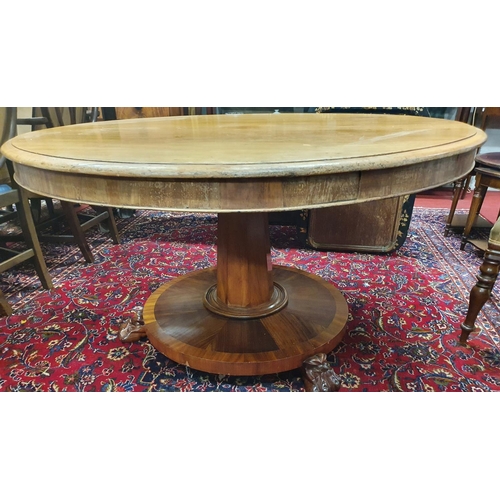 865 - A lovely 19th Century Mahogany Irish Centre Table with a lovely pedestal pod and hairy paw carved fe... 