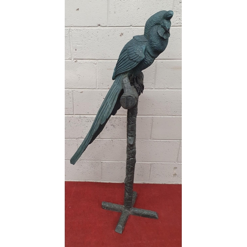 879 - A large Bronze Bird Sculpture on stand. H 146 cms approx.