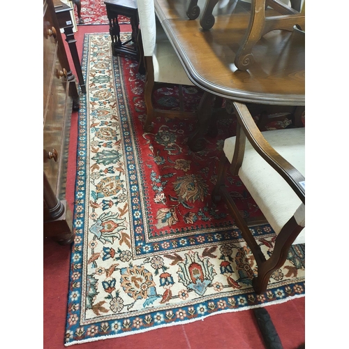 880 - A good Persian Tabriz cream and red ground Carpet with with an all over design and Ivory borders. 32... 