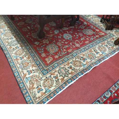 880 - A good Persian Tabriz cream and red ground Carpet with with an all over design and Ivory borders. 32... 