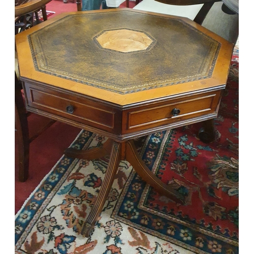 885 - A nice Yew wood octagonal Centre Table/Drum Table with leather insert. D 60 x H 65 cms approx.