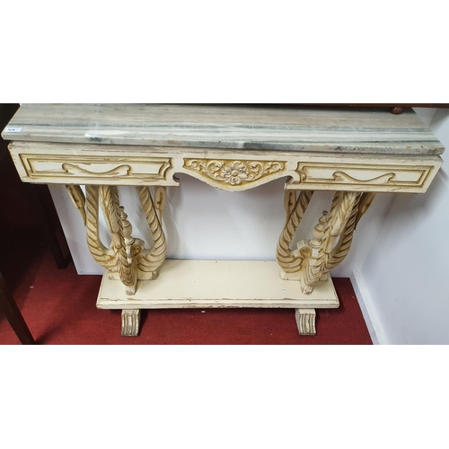 908 - A painted Console Table, the rectangular loose veined marble top raised on a painted and distressed ... 