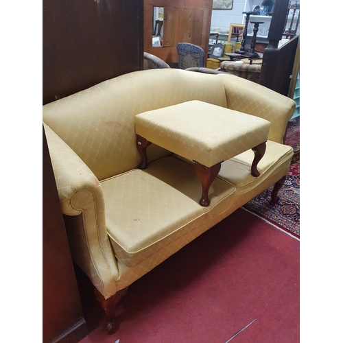 953 - A good 20th Century camel back 2 seater Couch with Mahogany supports.