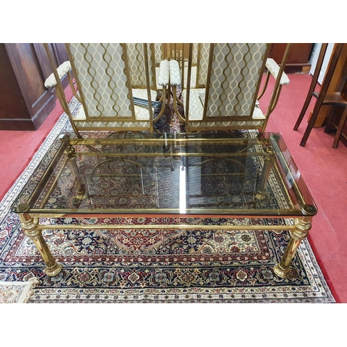 960E - A Brass Coffee Table with Glass top. 120 x 60 x H 44 cms approx.