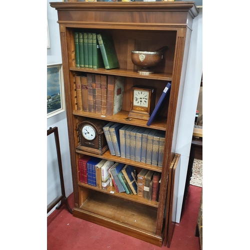 966 - A really good 19th Century Mahogany open book shelves with an unusual adjustable shelving movement a... 