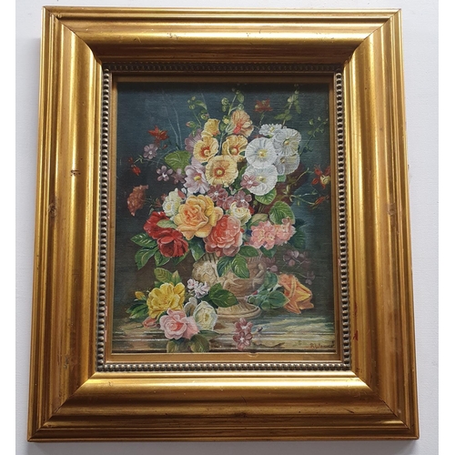 1002 - Oil on Canvas Still Life of flowers by R. Weaver  in good gilt frame. 34 x 27 cms approx.