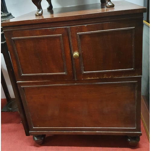 1004 - A Georgian Mahogany Side Cabinet with twin doors and lift up lid. 63.5 x 49.5 x H 76 cms approx.