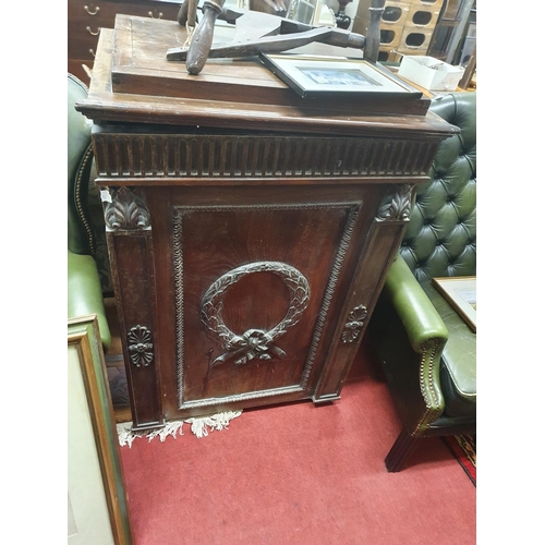 1032 - A superb quality early 19th Century Mahogany Pedestal with a highly carved front. (Needs work). W 75... 