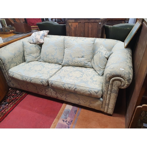 1037 - A good modern Chesterfield Couch with green Damask upholstery. W 200 x D 110 cms approx.