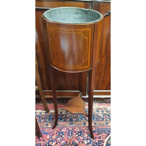 966b - An Edwardian Mahogany and inlaid Planter.