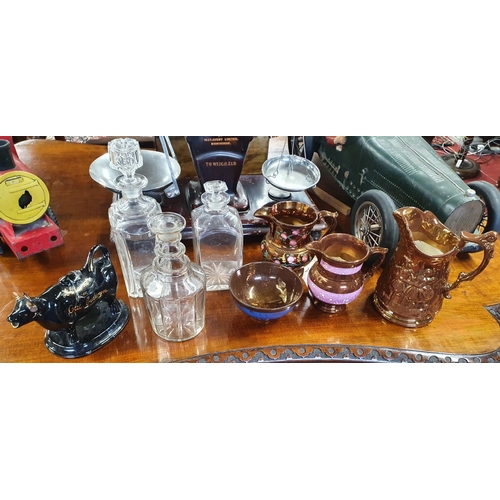 110f - A quantity of Luster wares along with three 19th Century - early 20th Century Decanters.