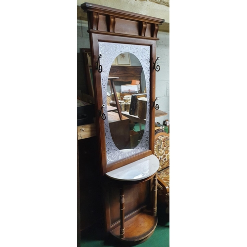 681 - An early 20th Century Coat Stand with etched mirror glass.