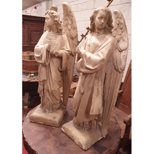 647 - A lovely pair of Early 19th Century plaster Angels. 30W x 30D x 103H cms approx.