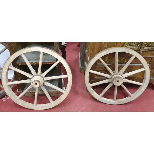 652 - A pair of Timber Wheels with metal strapping. 92D cms approx.