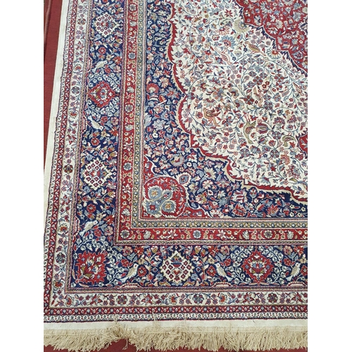 109 - A fantastic Cashmere Carpet with cream ground and multi borders. 340 x 247 cms approx.