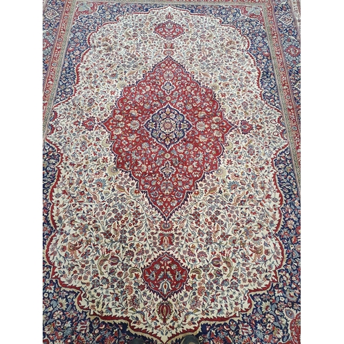 109 - A fantastic Cashmere Carpet with cream ground and multi borders. 340 x 247 cms approx.