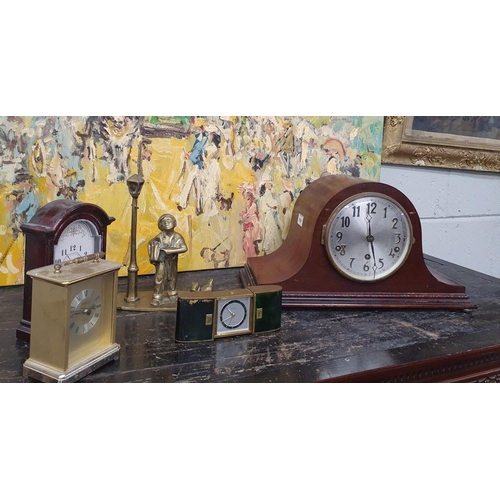 216 - A Mahogany Mantel Clock along with other clocks and a brass figural group. A quantity of Crystal and... 