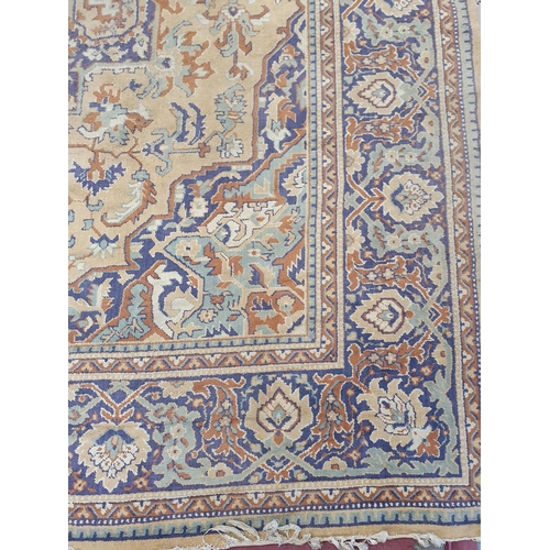 273 - A very large cream ground Carpet with multi borders and all over design. 242 x 320 cms approx.