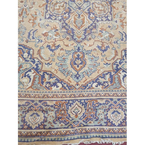 273 - A very large cream ground Carpet with multi borders and all over design. 242 x 320 cms approx.