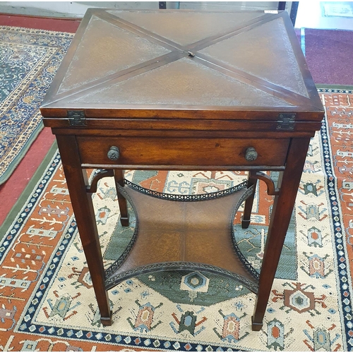 117 - A Mahogany envelope Card Table with leather inserts.