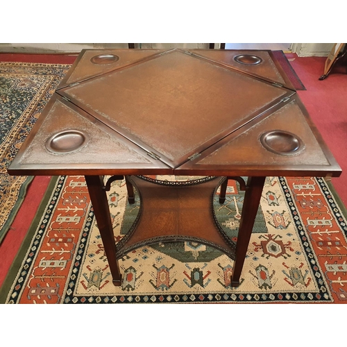 117 - A Mahogany envelope Card Table with leather inserts.