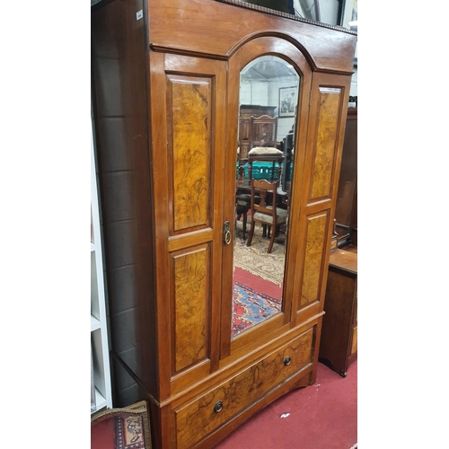 220 - A late 19th Century Walnut three door Wardrobe along with its Dressing Table partner and another sin... 