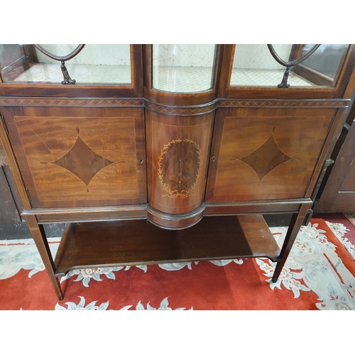 254 - A fantastic quality Edwardian Mahogany and inlaid Display Cabinet with the bow center glass planked ... 