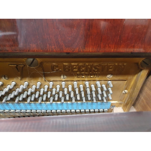 264 - A good C. Bechstein Upright Piano with inlaid case. Stamped C. Bechstein Berlin on the music board.