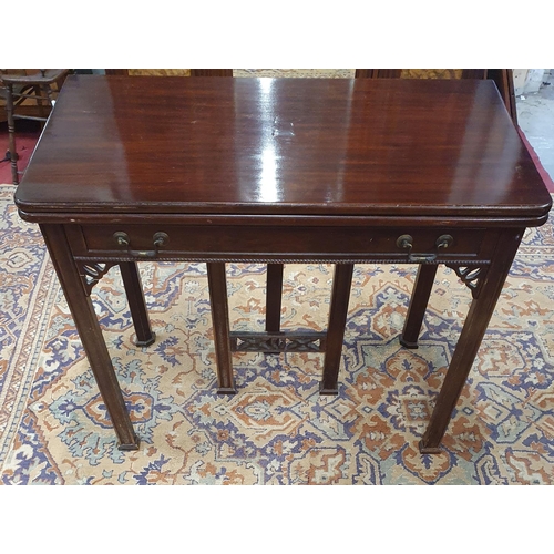 270 - A very unusual early 20th Century Mahogany Fold Over Tea Table/Dining Table with three extra leaves.