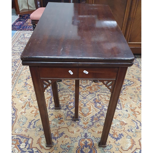 270 - A very unusual early 20th Century Mahogany Fold Over Tea Table/Dining Table with three extra leaves.