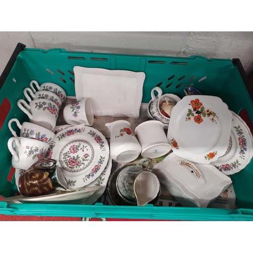 209 - A good quantity of Arklow pottery Tea Wares along with Aynsley and other items in 2 crates.