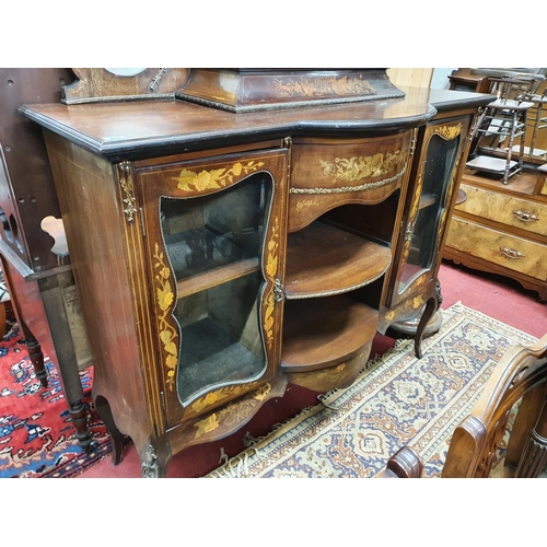 289 - A late 19th Century Mahogany and inlaid Display Cabinet with bow fronted outline.W 138 x D 46 x H 20... 