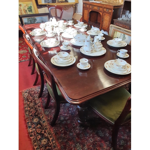 311 - A good mid Victorian Mahogany two leaf Dining Table with turned and fluted supports. l 230 x W 122 c... 