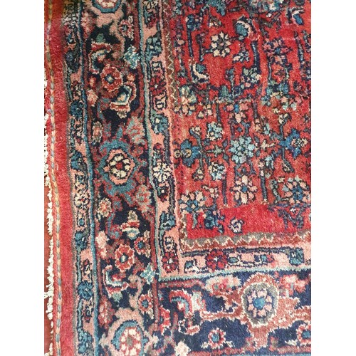 310 - A good Persian Carpet with multi borders and unique design. 235 x 185 cms approx.