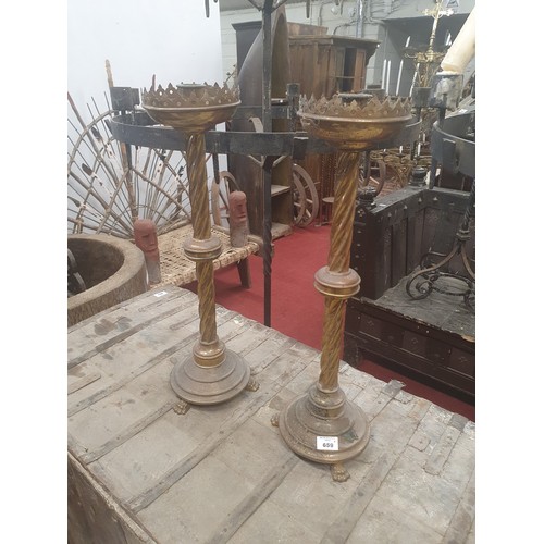 659 - A good pair of heavy Brass Candlesticks.  56cms approx.