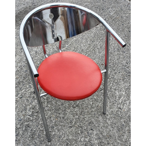 133 - Silver metal Chair with red seat. Generic photo.