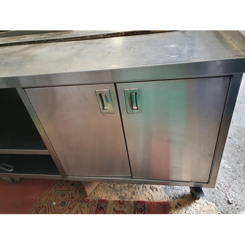 336 - A very large kitchen Press with heated serving top. 285W x 80D x 90H cms approx.