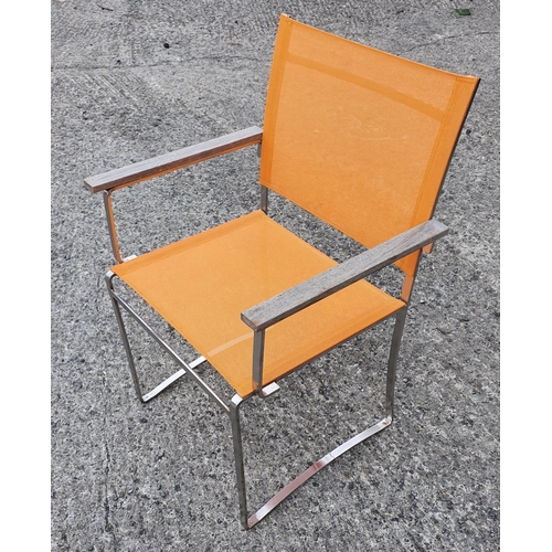 375 - Royal Botania Designer Chrome Armchair with orange fabric seat. Please note this is a generic photo.... 